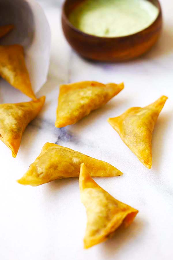 Buffet-style easy and quick Indian deep-fried Samosa appetizer filled with spiced potatoes recipe.