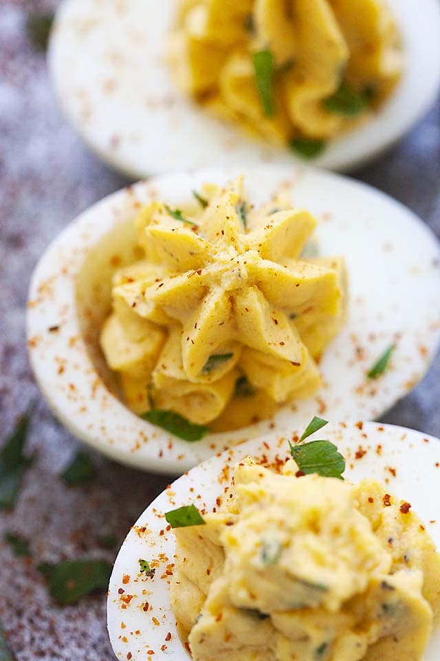 Top down picture of deviled eggs, served as an appetizer during holidays.