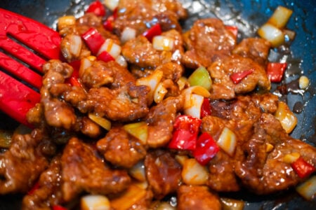 Panda express Beijing beef in a wok, ready to serve. 