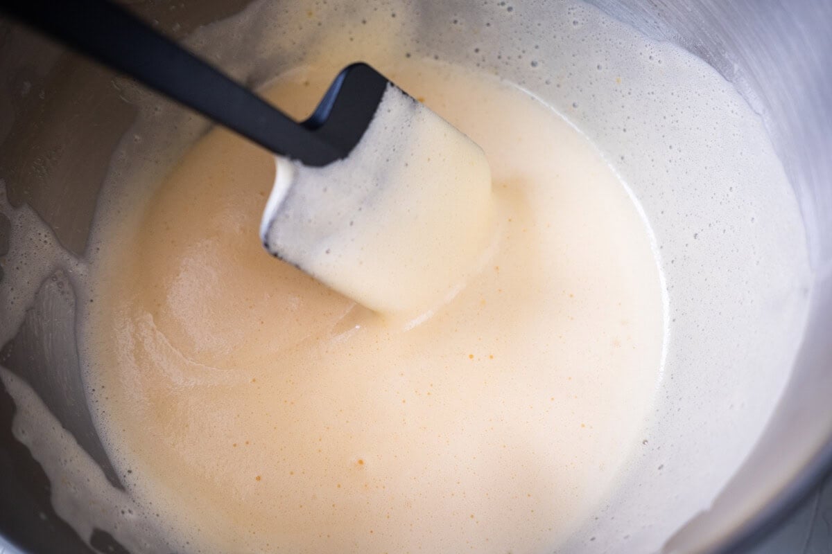 Making the batter of mini egg cake. 