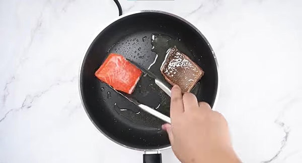 Pan-sear the salmon until the skin is crispy. 