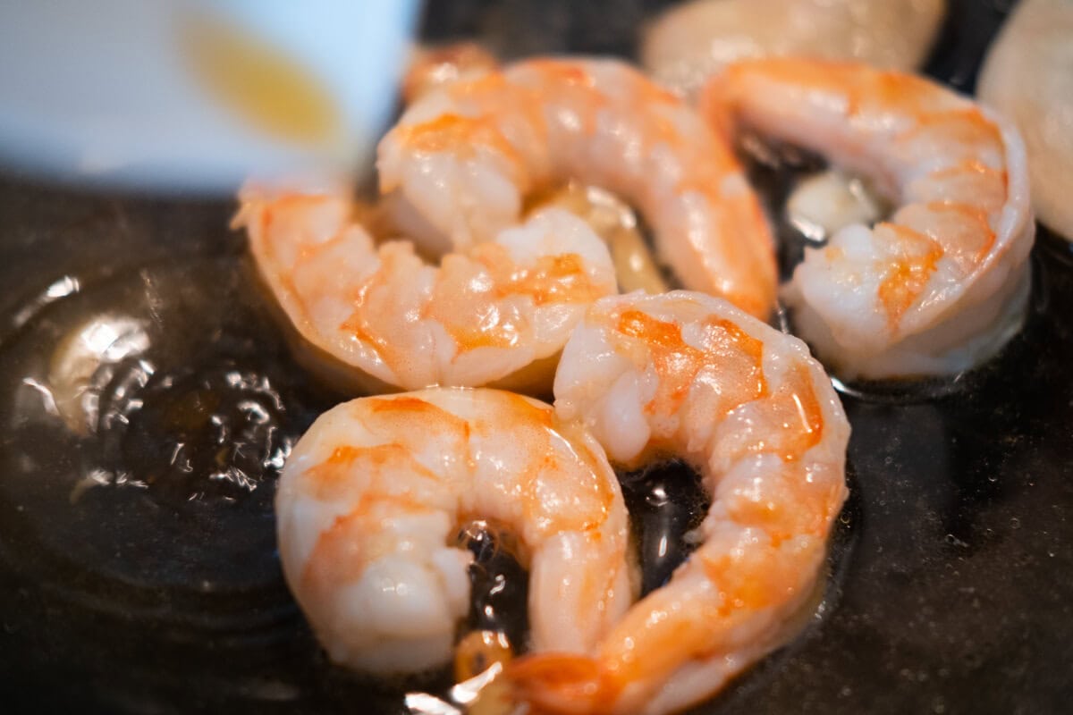Cooking shrimp in a pan. 