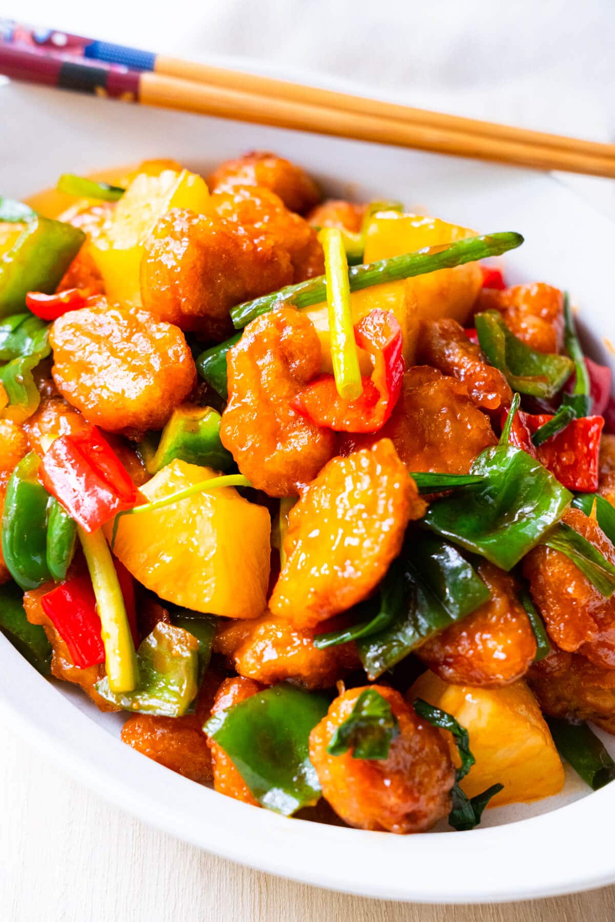 Cantonese style sweet and sour pork with pineapples. 