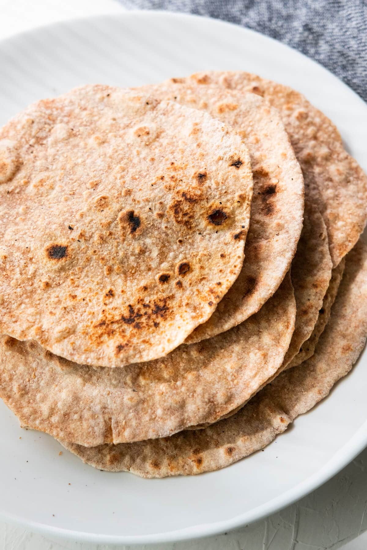 Chapati Indian flatbread served on a plate.