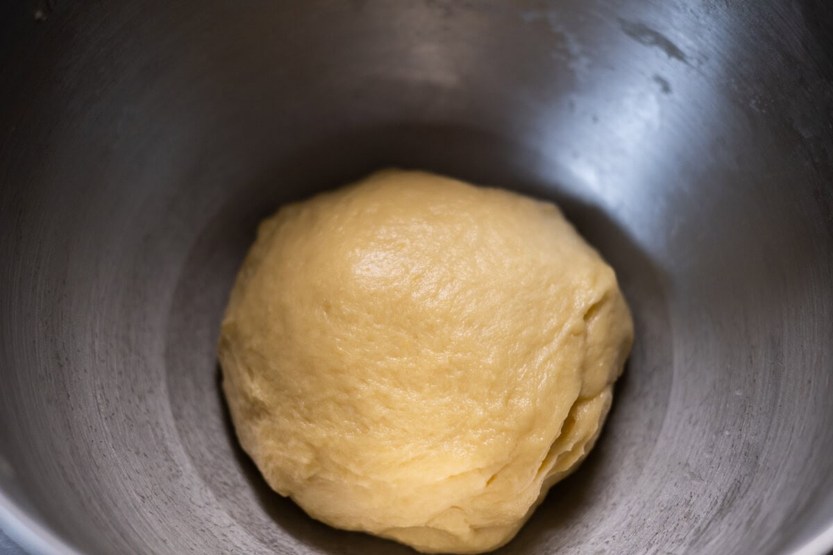 Brioche dough in a bowl. 