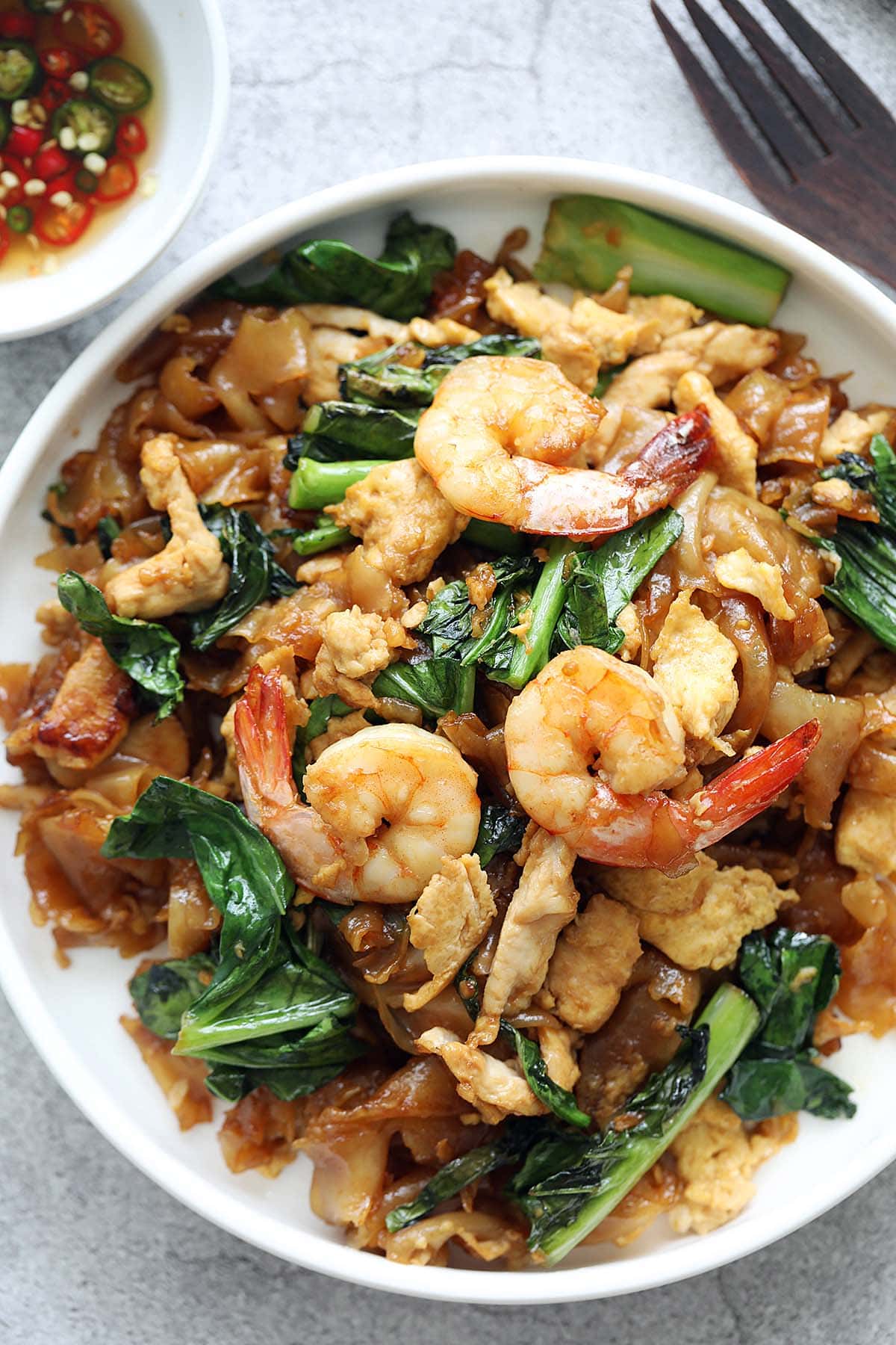 Authentic Pad see ew chicken and shrimp with vegetable. 