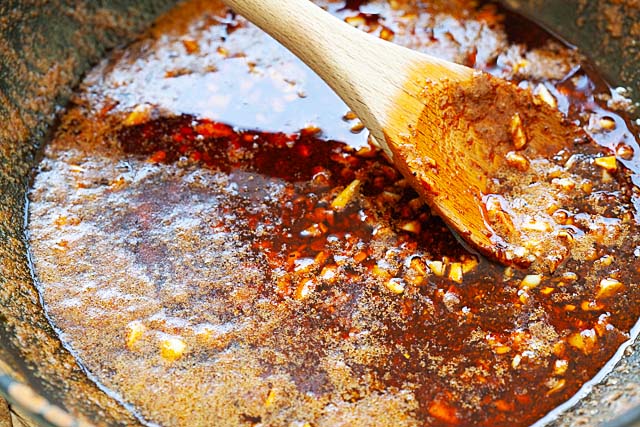 Making seafood boil sauce using butter and homemade Cajun seasoning.