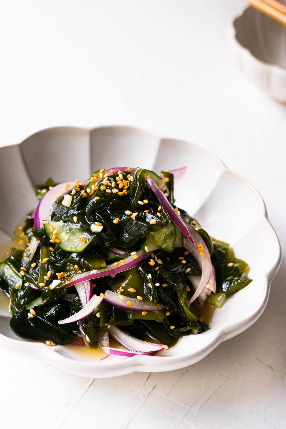 Korean seaweed salad banchan garnished with white sesame seeds.