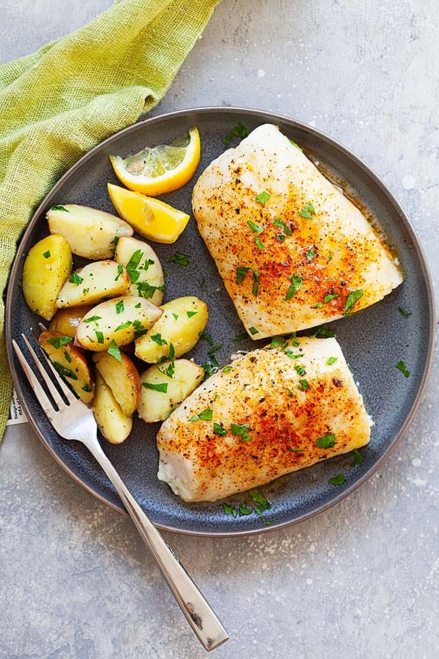 Bake cod on a round plate, with a side of boiled potatoes. 