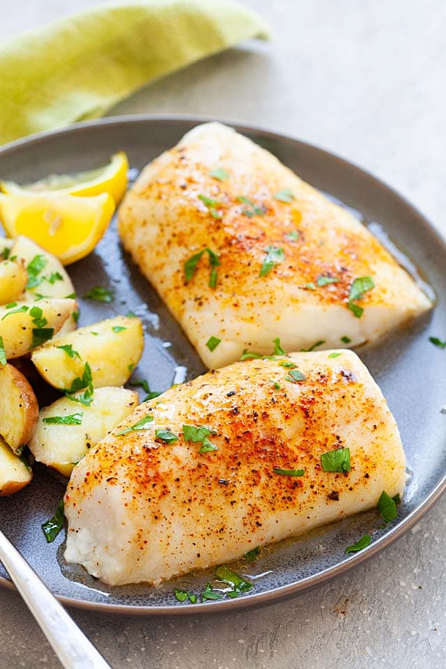 Baked fish with a side of boiled potatoes. 