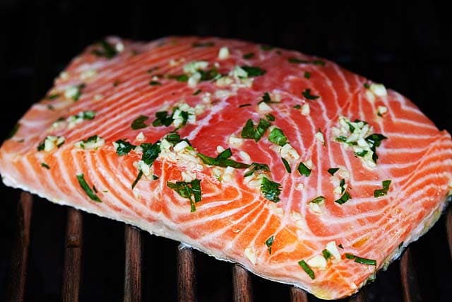 Grilling salmon with skin on a gas grill.