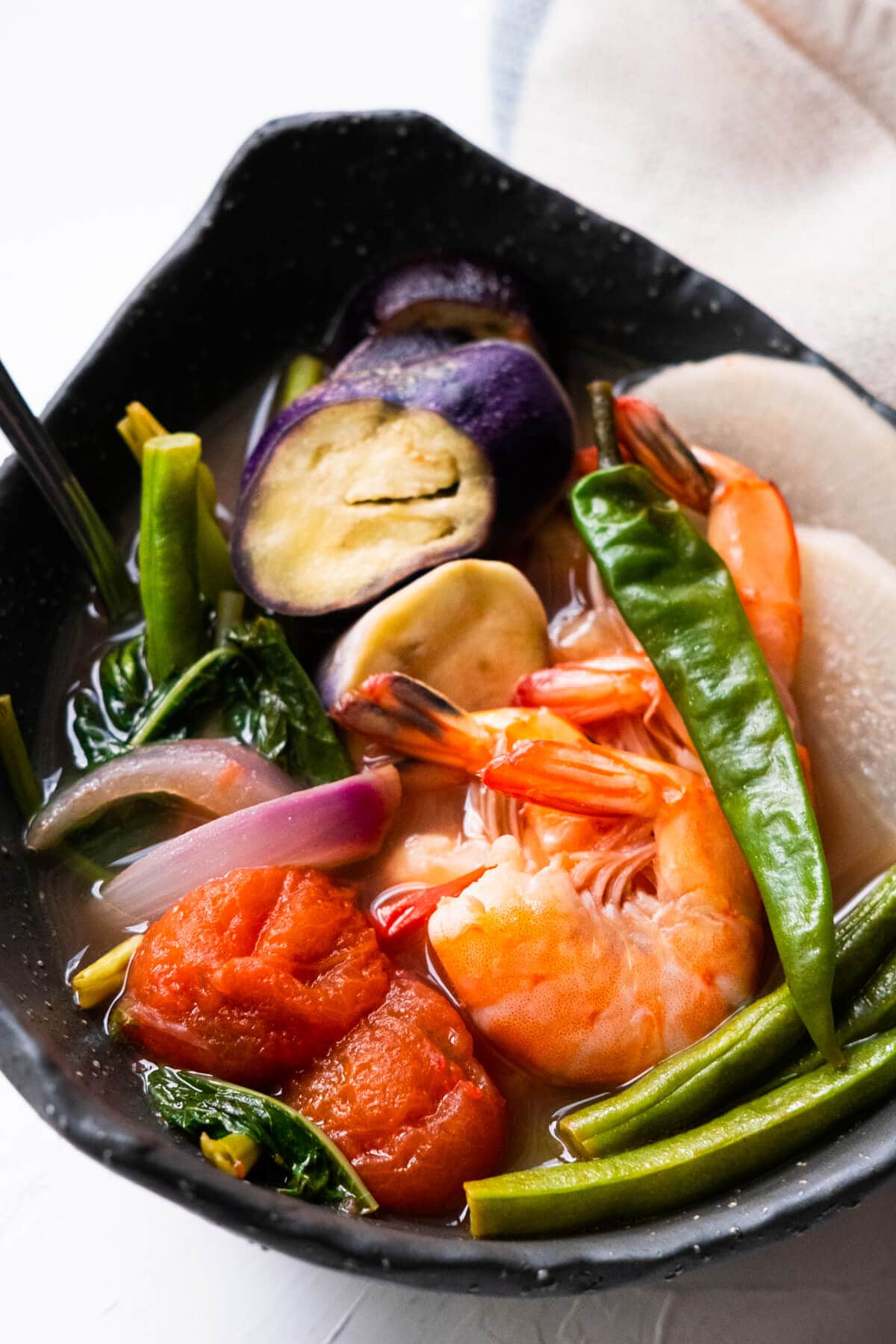 Delicious sinigang, a Filipino stew, made with shrimp.