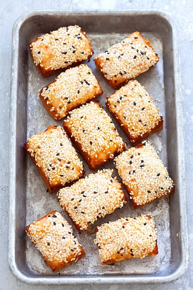 Shrimp toast topped with sesame seeds, ready to eat.