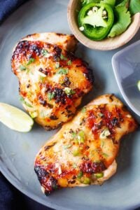 Grilled chipotle lime chicken served on a plate.