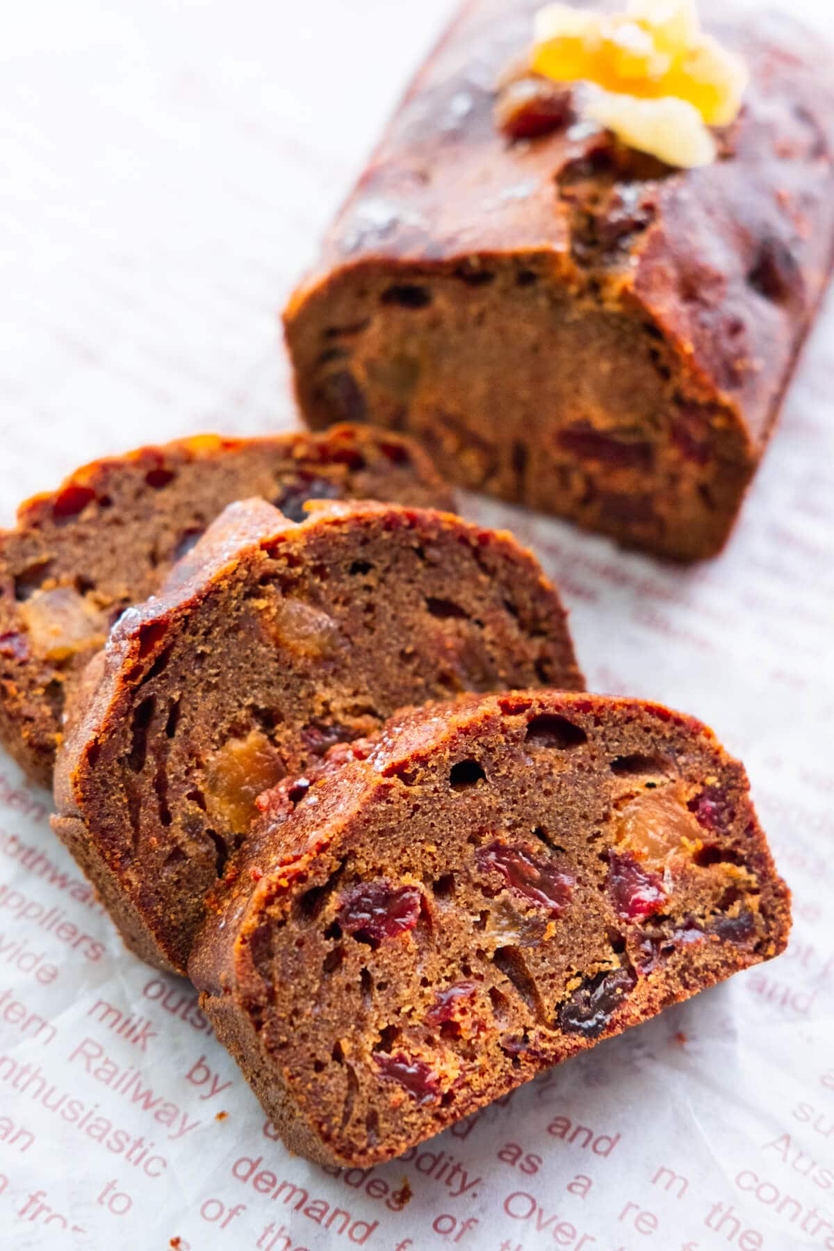 Moist fruit cake cut into slices. 