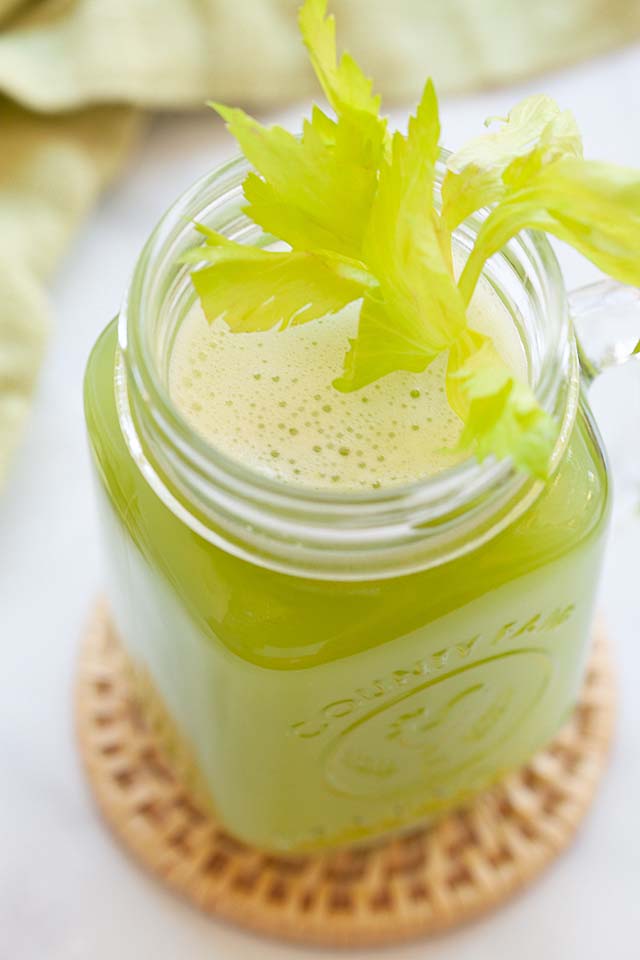 Close up shot of celery juice in a glass.