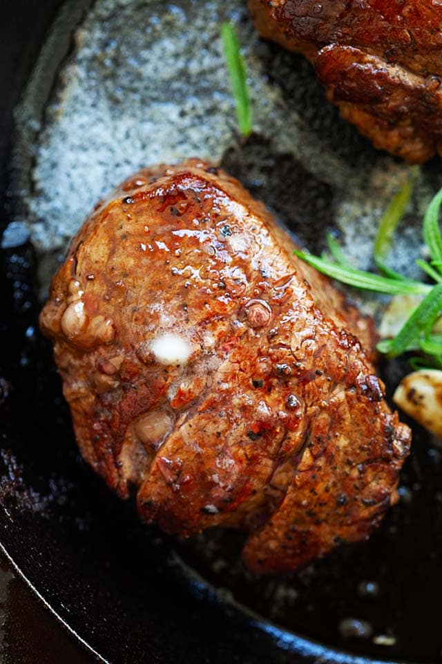 Filet mignon on a skillet, ready to serve.