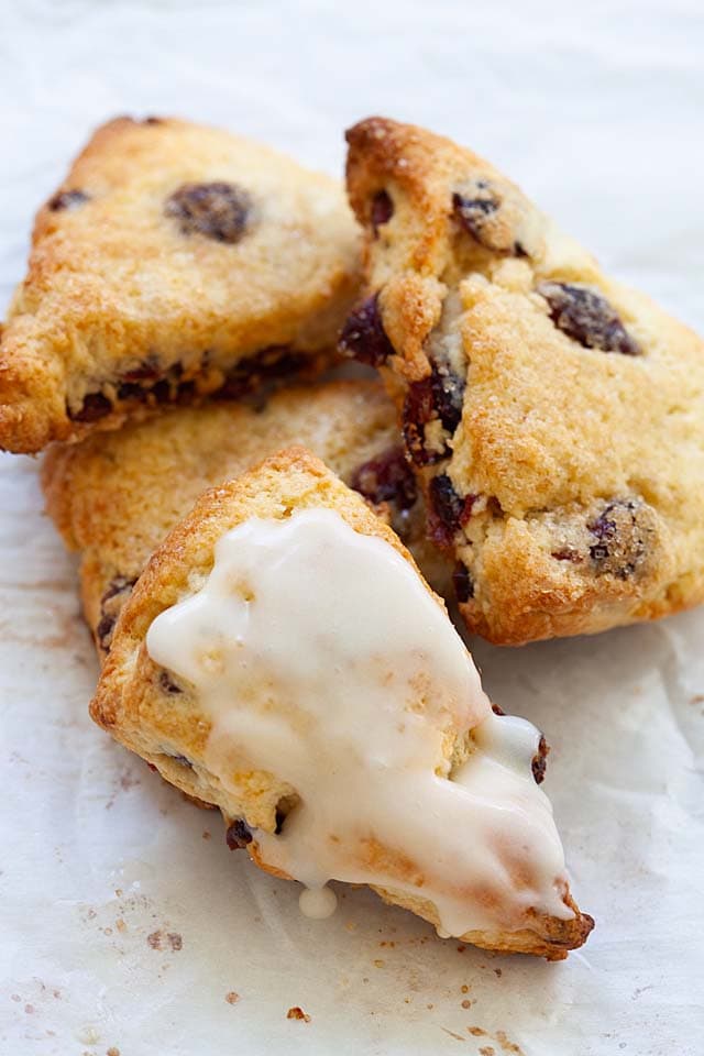 Glazed scones with dried cranberries.