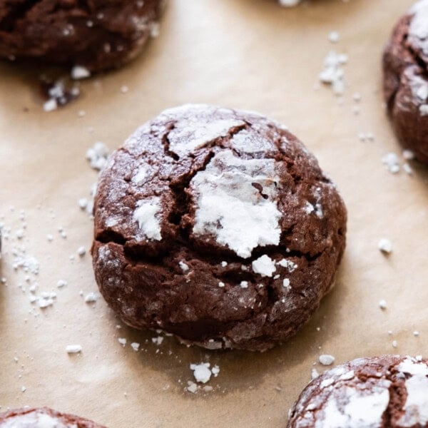 Chocolate crinkle cookies, freshly baked in the oven.