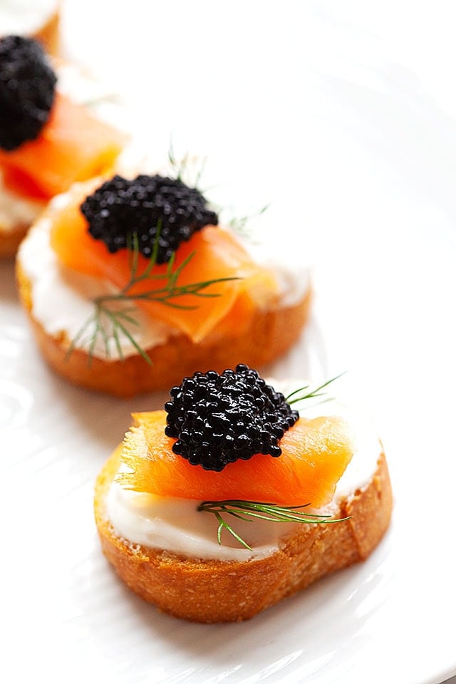 Crostini appetizers on serving platter.