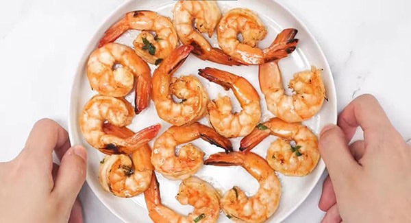 Grilled shrimp recipe served on a plate.