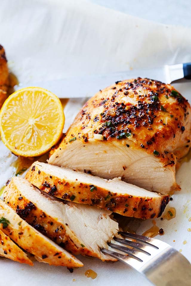 Baked boneless chicken breast, sliced into pieces.
