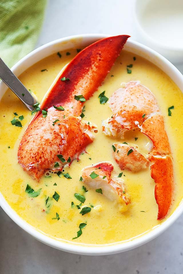 Lobster bisque soup with lobster meat and lobster claws.