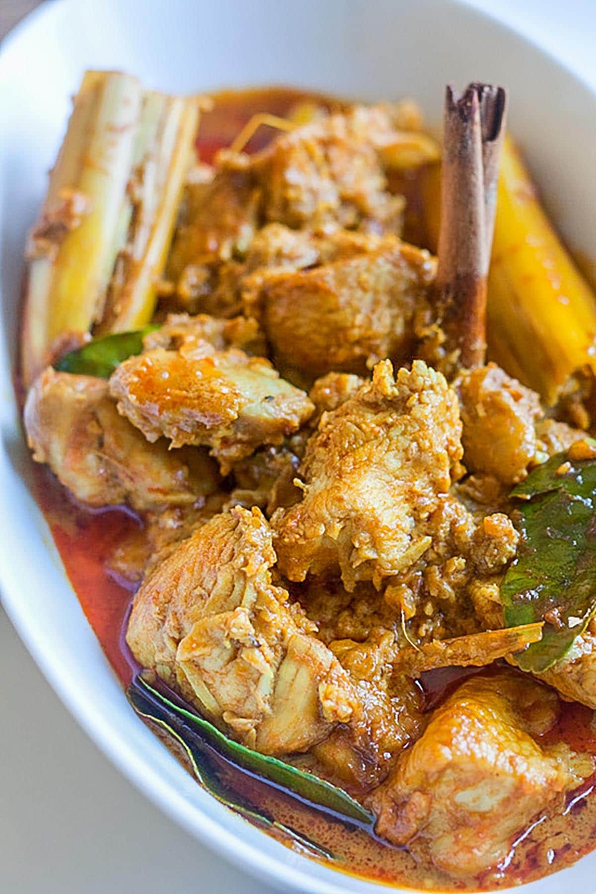 Delicious chicken curry and authentic chicken curry recipe with chicken, curry paste, and coconut milk. Chicken curry has never been this good! | rasamalaysia.com