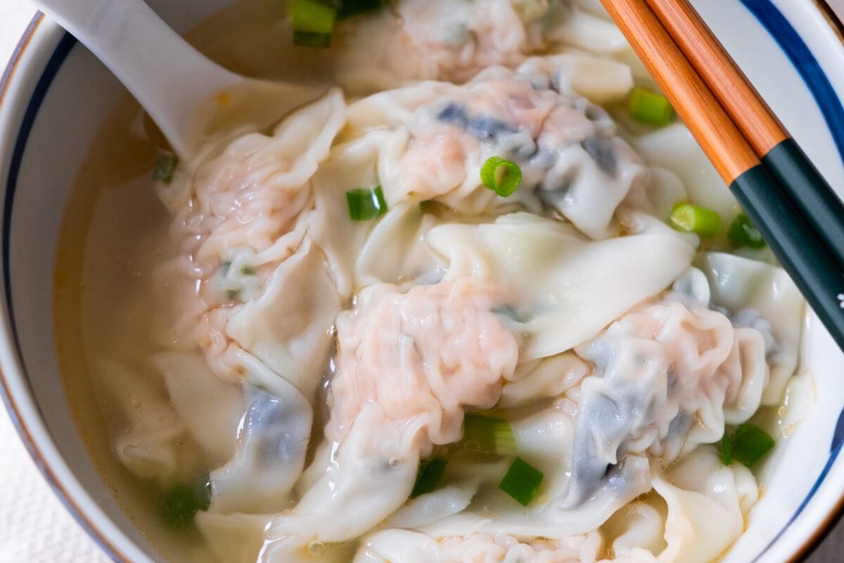 Chinese dumpling soup with pork and shrimp dumplings. 