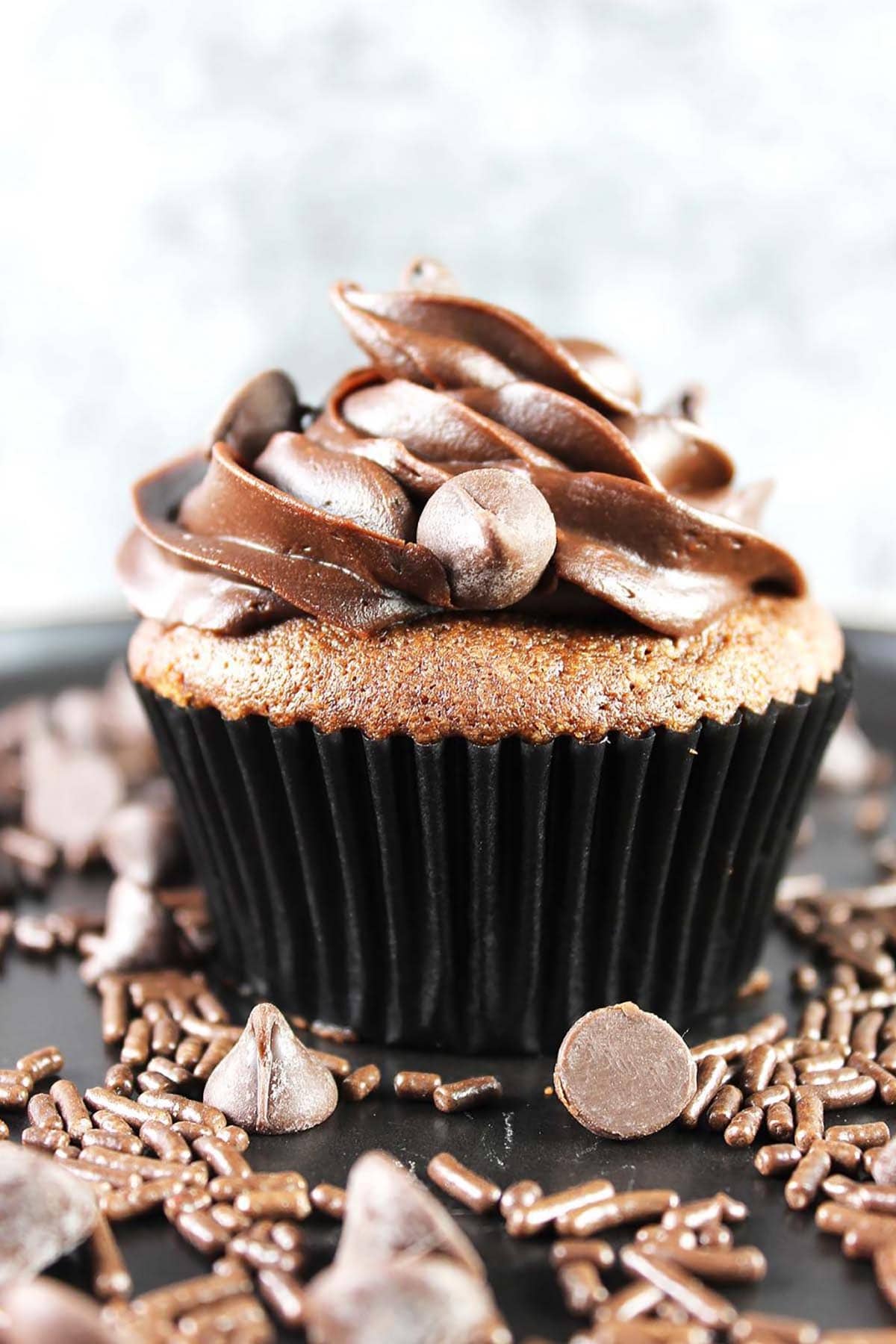 Ganache on top of a cupcake.