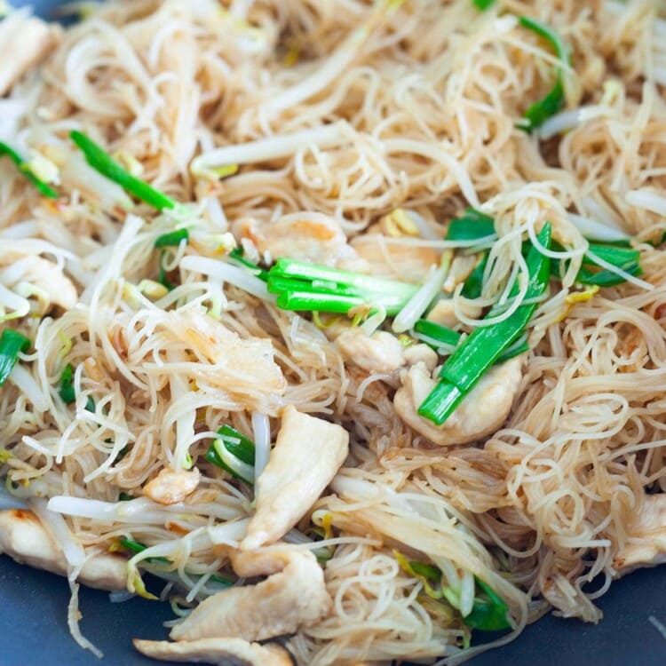 Rice vermicelli, stir-fried in a skillet.