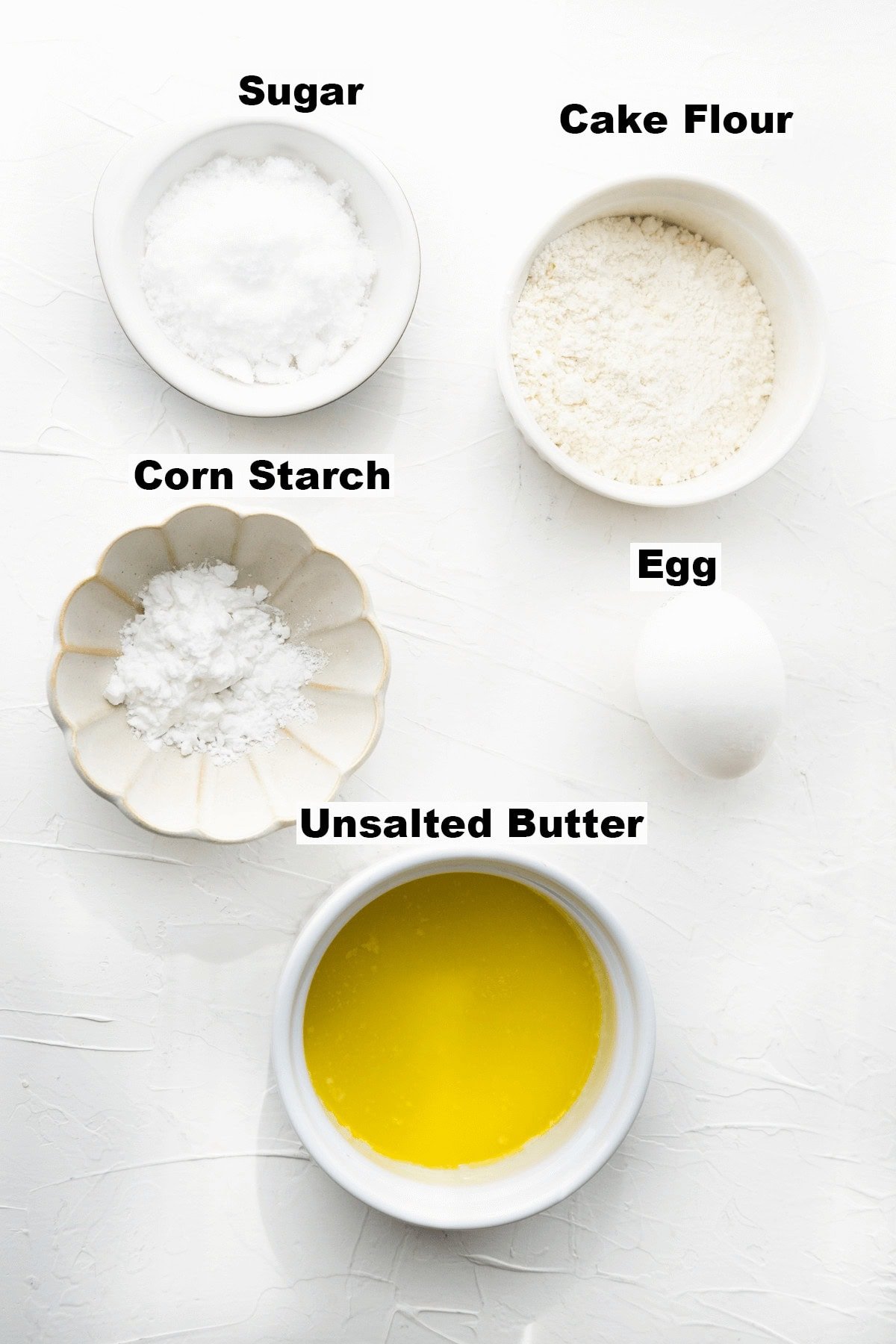 Recipe ingredients for paper wrapped sponge cake. 