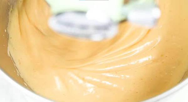 Egg yolk batter in a stand mixer.