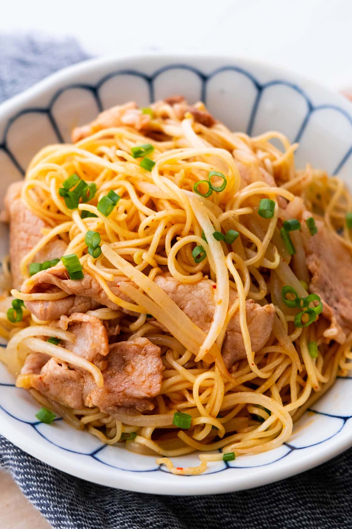 Easy Chinese sweet and sour stir fry pork noodles.