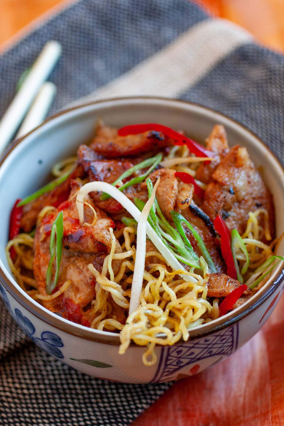Easy and quick homemade sweet sour pork with noodles, ready to serve.
