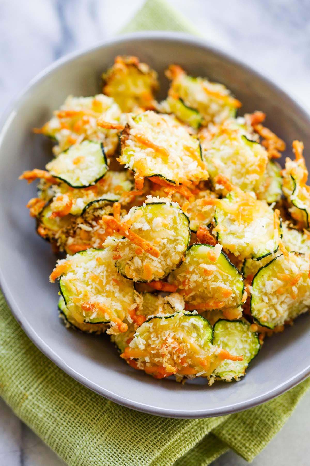 Parmesan Zucchini Chips served in a bowl.