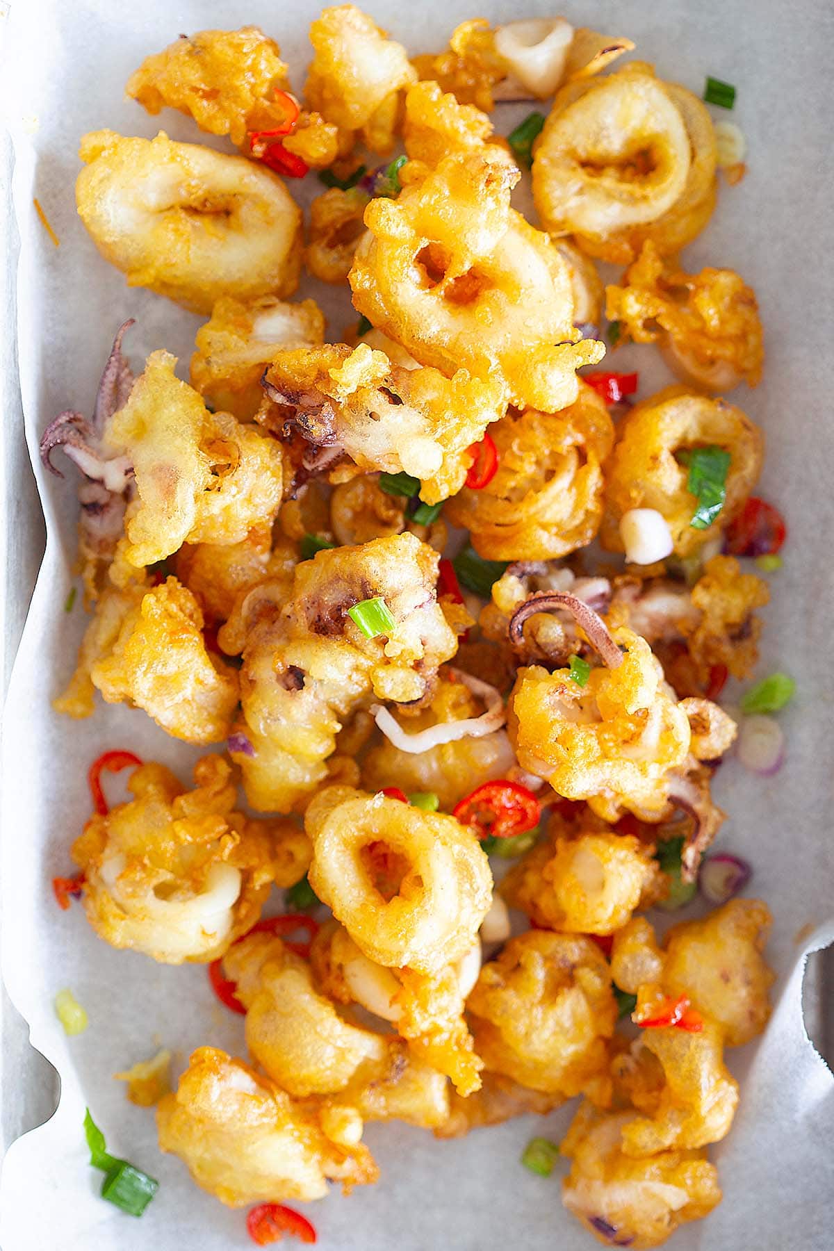 Salt and pepper squid on a plate.