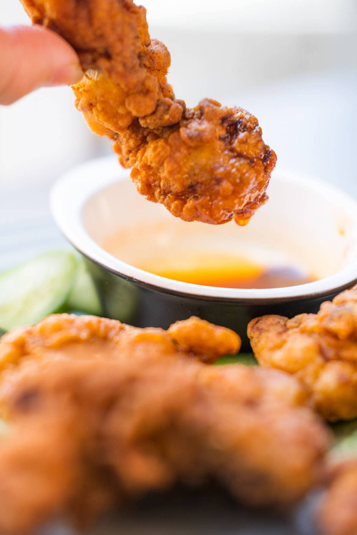 Nashville fried chicken dip into a hot sauce. 