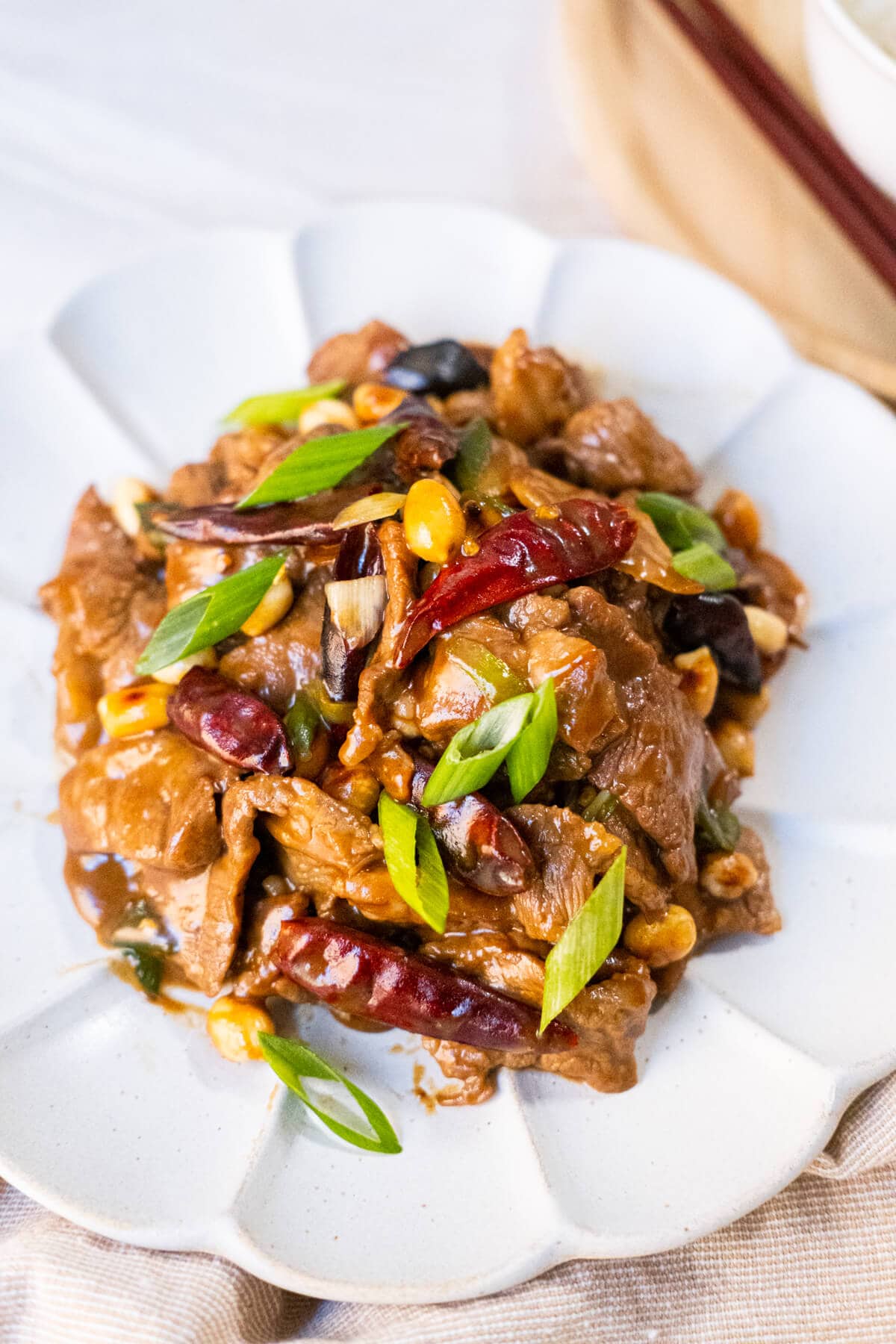 A plate of spicy Kung Pao Beef served on a plate. 