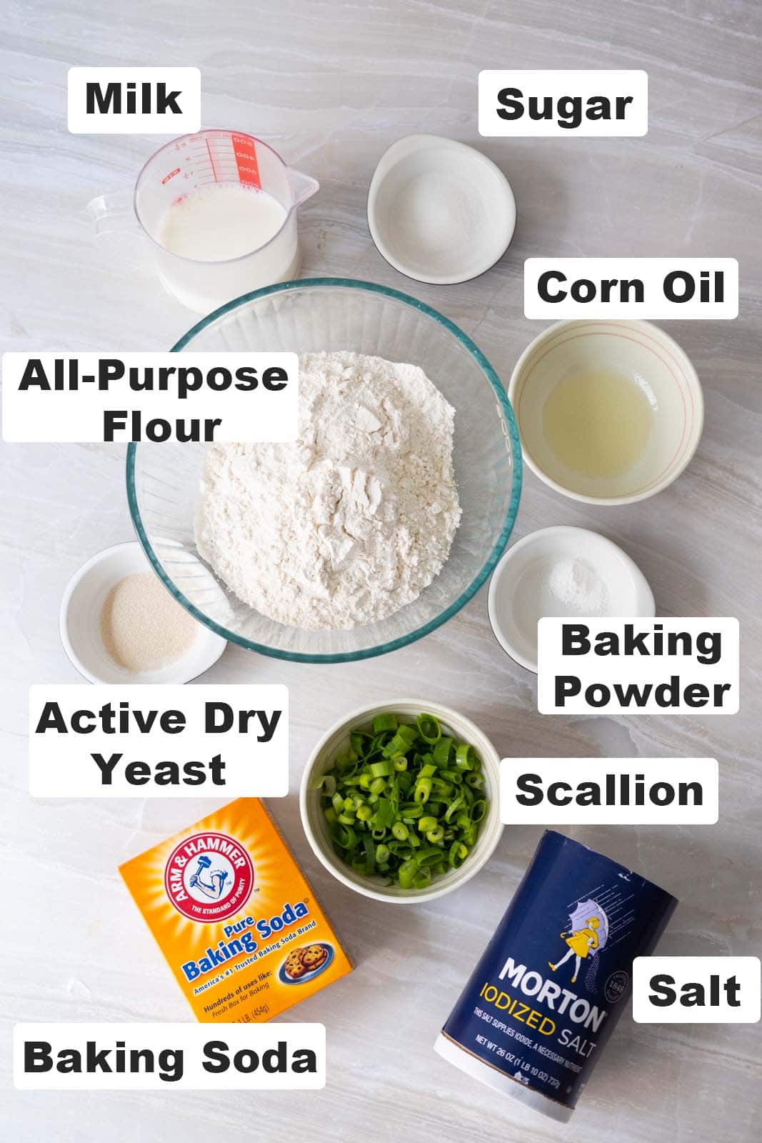 All ingredients placed on table for scallion buns' recipe.