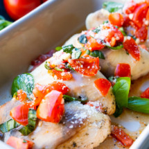 Bruschetta chicken served with refreshing tomato basil on top.