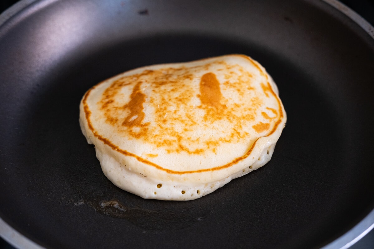 Cook the pancake in a nonstick frying pan until light brown. 