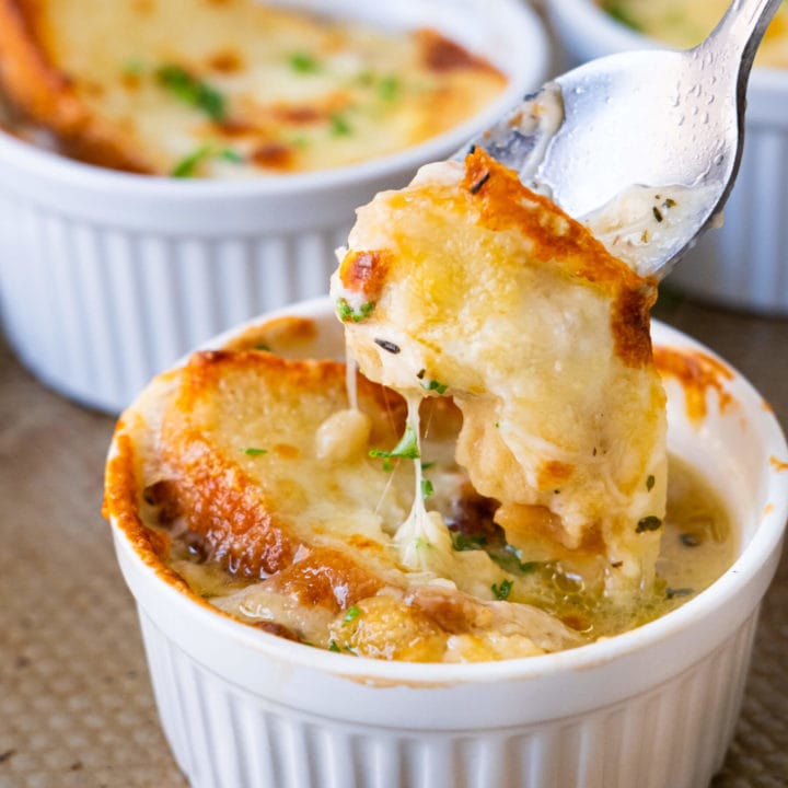 Cheesy easy French onion soup topped with french bread and melted cheese.