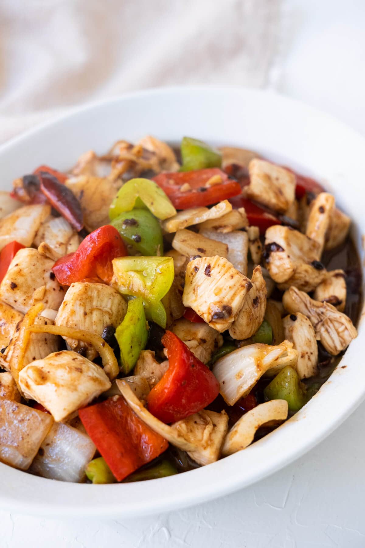 Chicken with red and green bell peppers coated in black bean sauce.