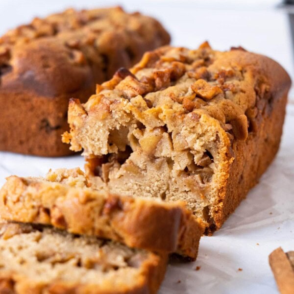 Two mini apple cinnamon bread sliced with apple fillings infused in the center.