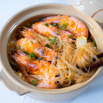 Shrimp and glass noodles in a earthenware clay pot.