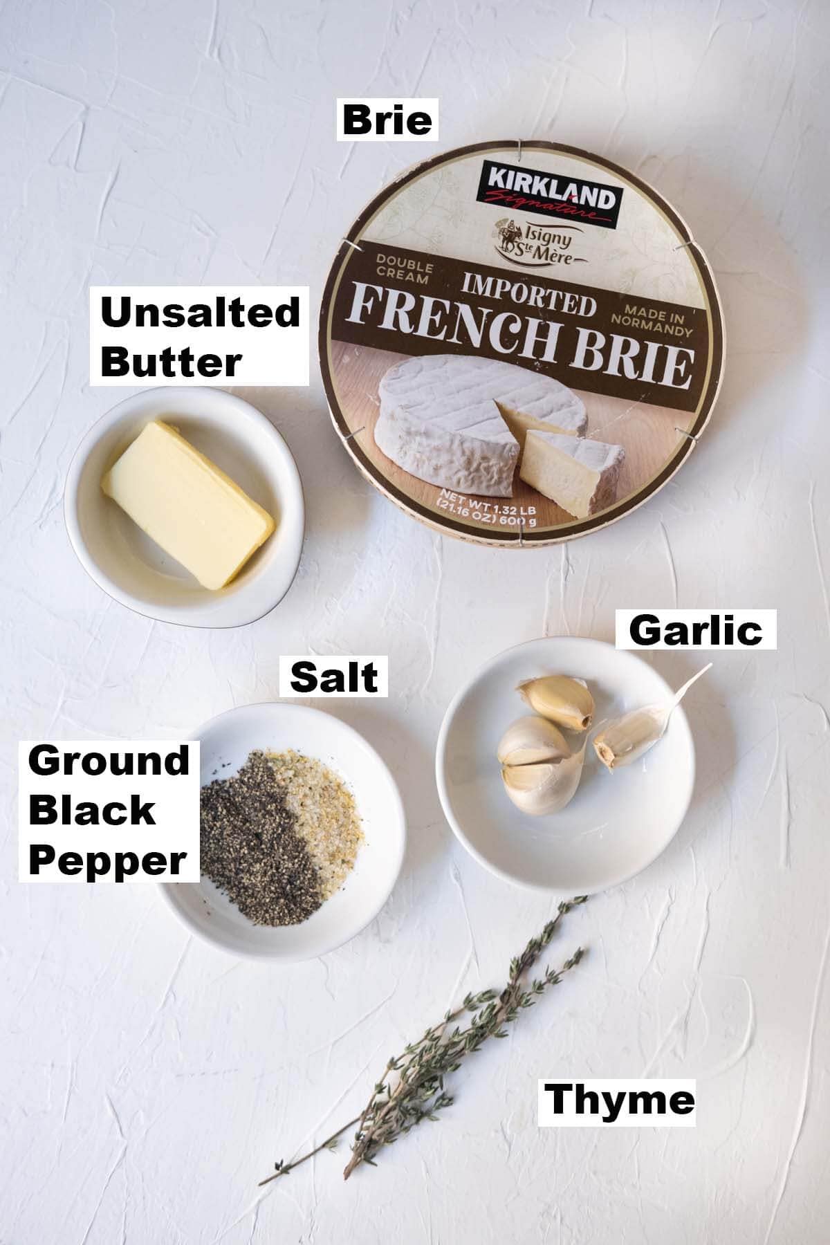 Ingredients for garlic butter baked brie recipe. 