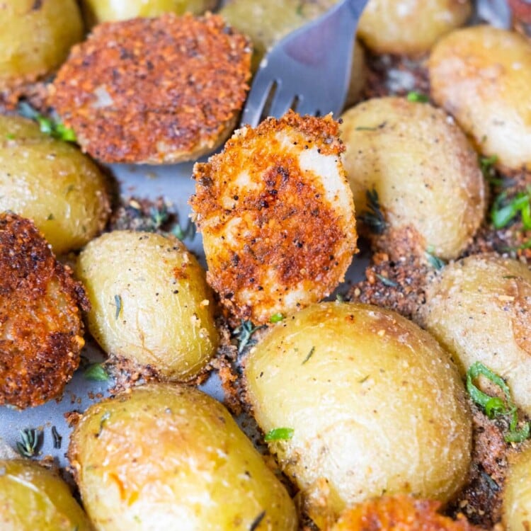 Parmesan crusted potatoes are baked golden crispy on the bottom.