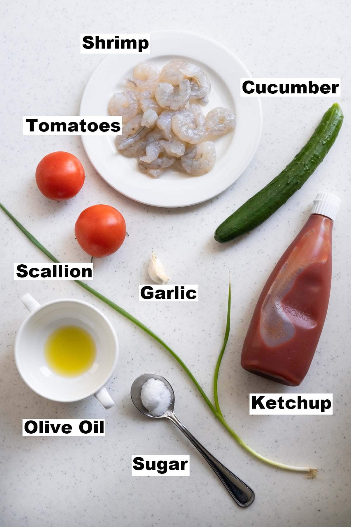 Ingredients for tomato and shrimp salad recipe.