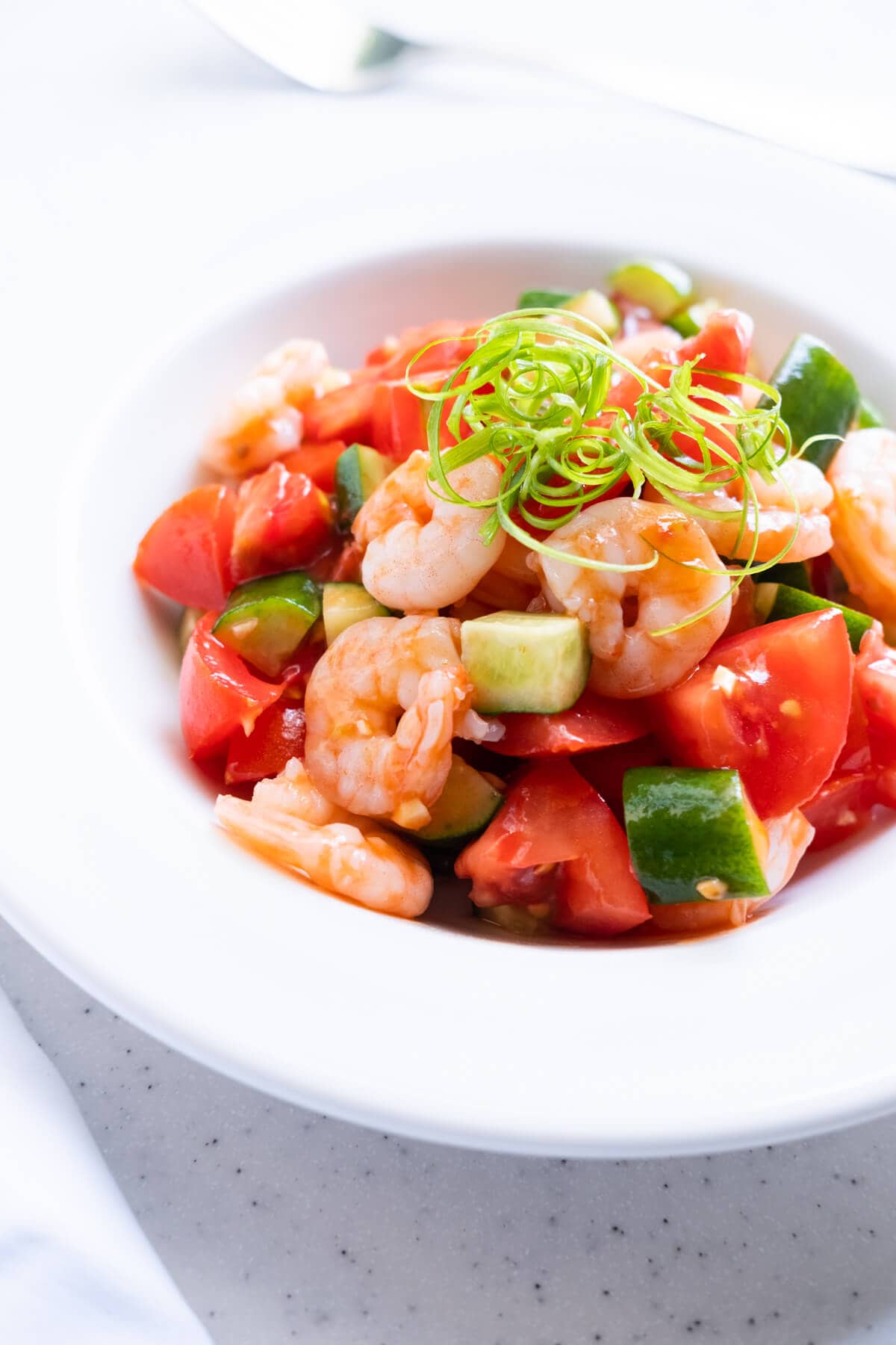 Tomato and shrimp salad with cucumber in a sweet and tangy ketchup dressing. 